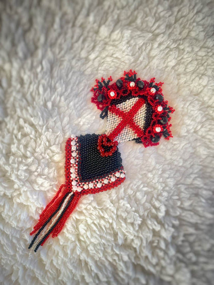 Brooch with flechette by Ukrainian artist Anna Huliaieva, recovered in Kyiv Oblast, 2022