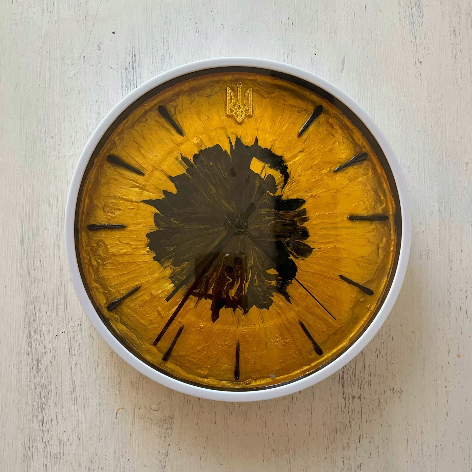 Clock with flechettes designed by Anna Huliaieva made from 2022 Russian flechettes collected in Kyiv oblast