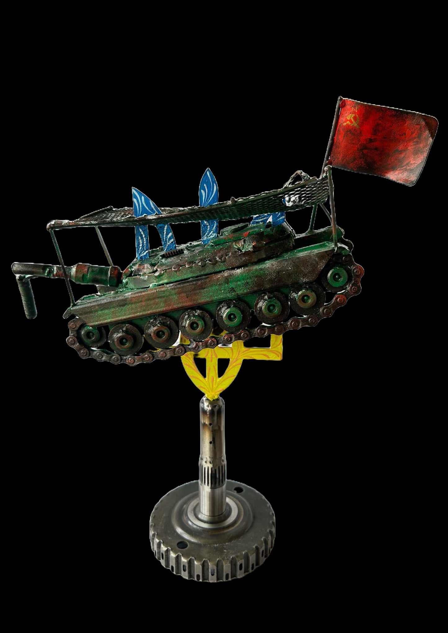 Destroyed Russian tank with Soviet flag impaled on Tryzub sculpture