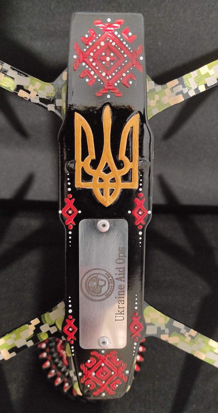 Drone painted in blue and yellow Ukrainian patterns by Tetyana Shacun, design by Hisoshi Art Studio