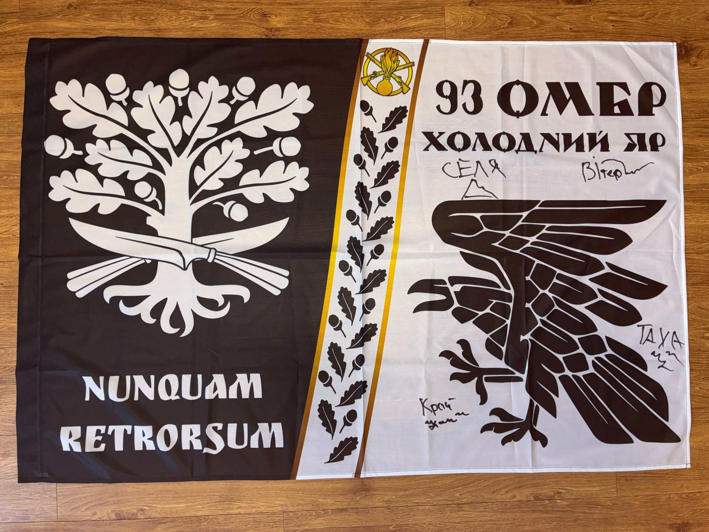 Flag of the 93rd Brigade Kholodnyi Yar signed by warriors for donation to support Ukrainian defenders