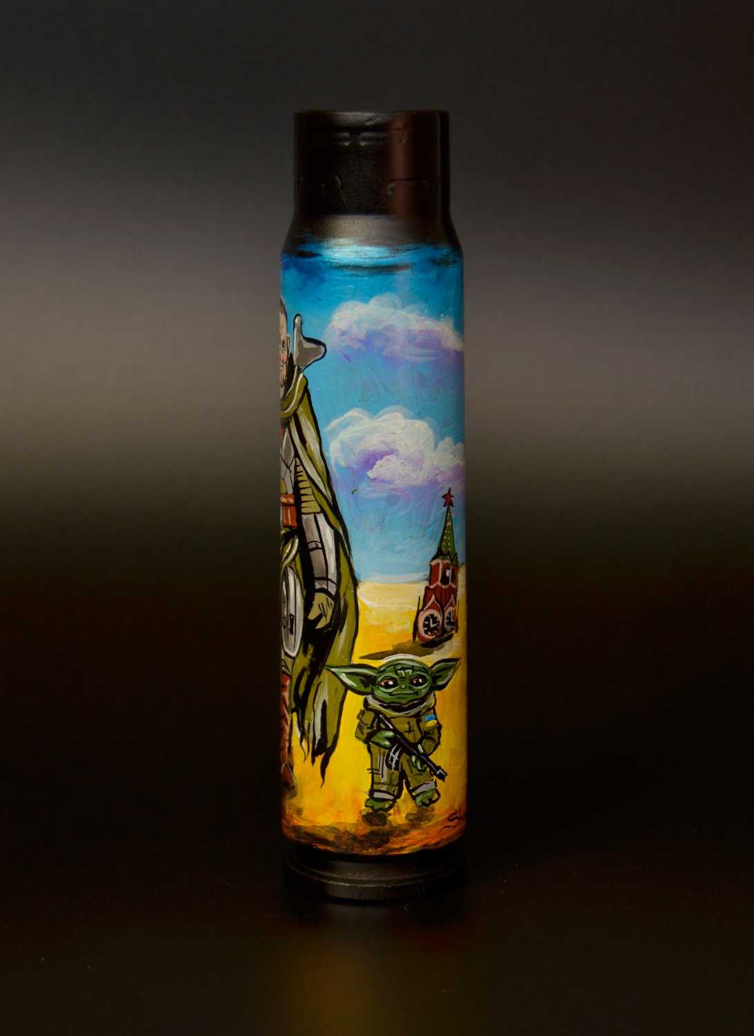 General Zaluzhnyi and Grogu illustrated on a 30mm shell by Tanya Shacun