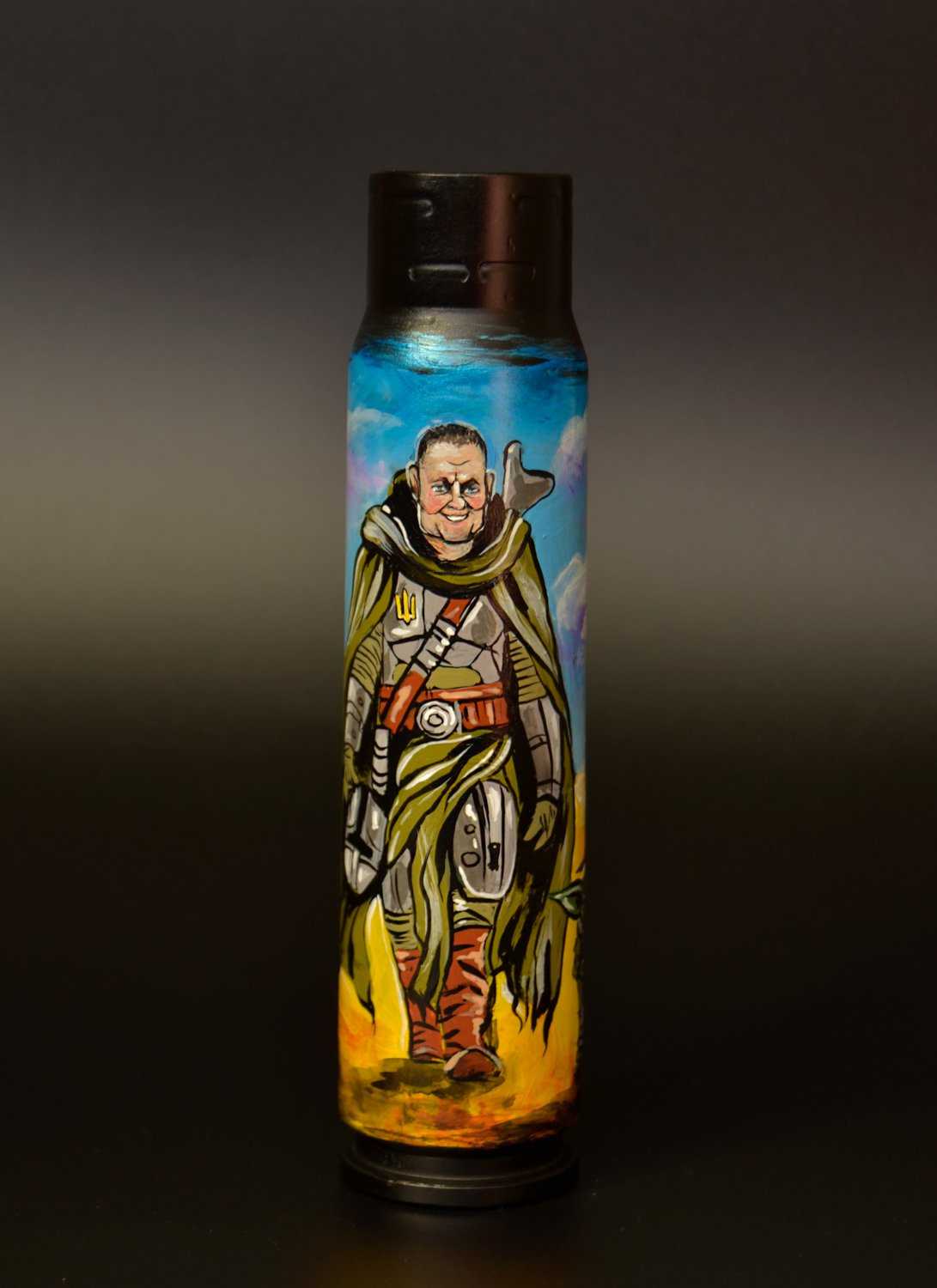 Portrait of General Zaluzhnyi and Grogu drawn on a 30mm shell by Tanya Shacun