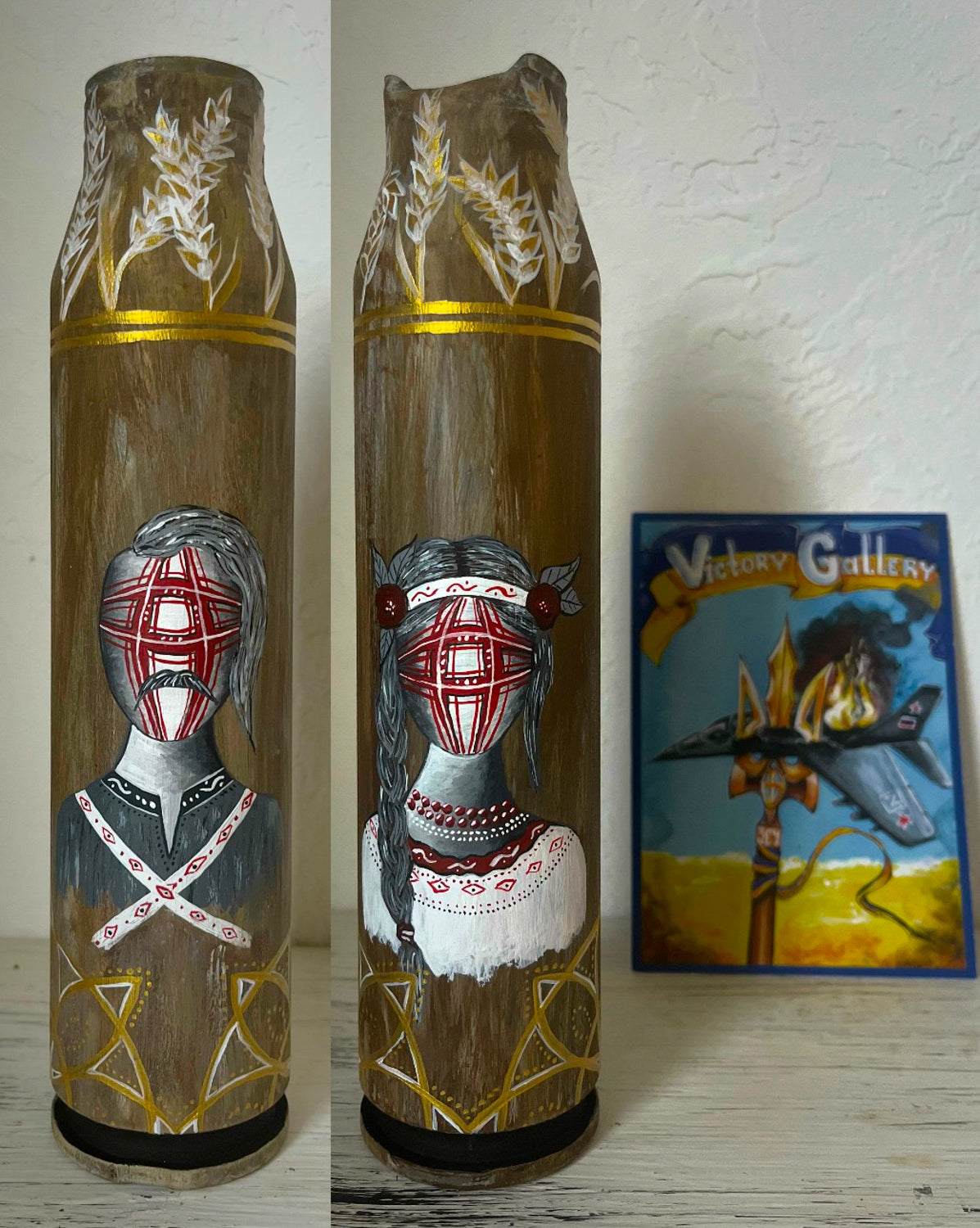Gepard shell with drawing of Ukrainian motanka doll, 25cm tall, 5.5cm base, handmade by Anna Huliaieva