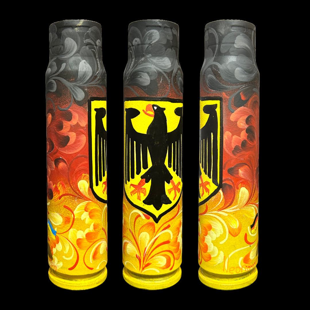30mm shell painted in German flag colors standing 16.5cm tall to thank Germany