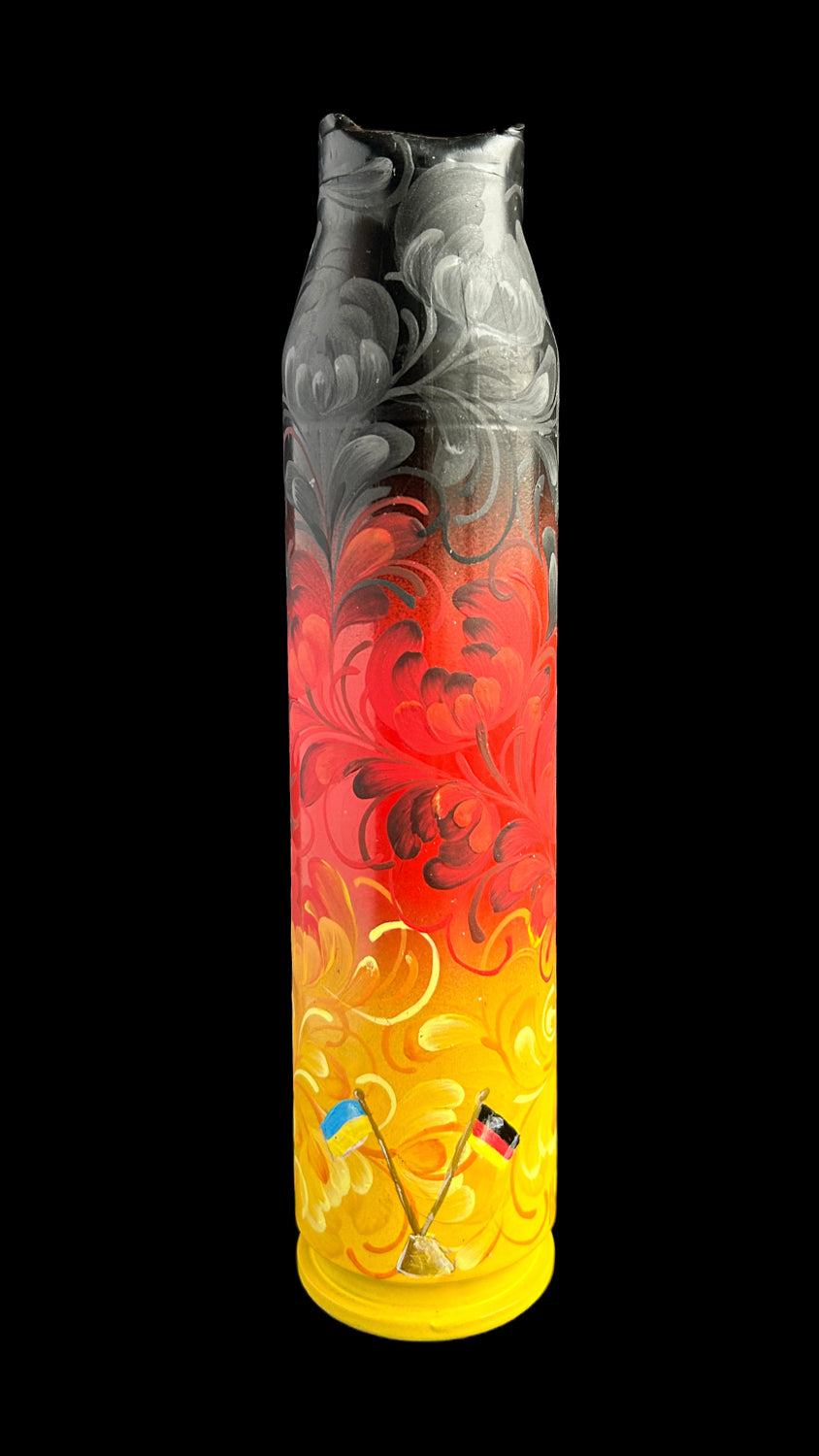 30mm Flakpanzer Gepard shell painted with German flag colors by Anastasia Leonova