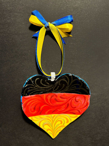 Germany Iron Heart ornament painted with German and Ukrainian flag colors made from 122mm grad rocket