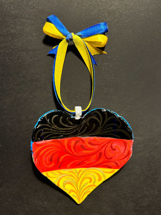 Germany Iron Heart ornament painted with German and Ukrainian flag colors made from 122mm grad rocket