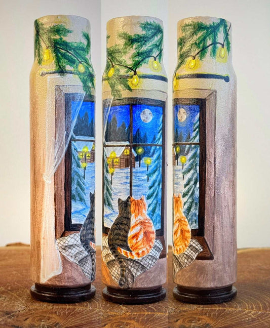 Germany 30mm shell painted with two cats by a snowy window, festive greenery and glowing yellow lights