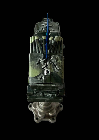 Destroyed Grad rocket model impaled on 33cm Tryzub sculpture