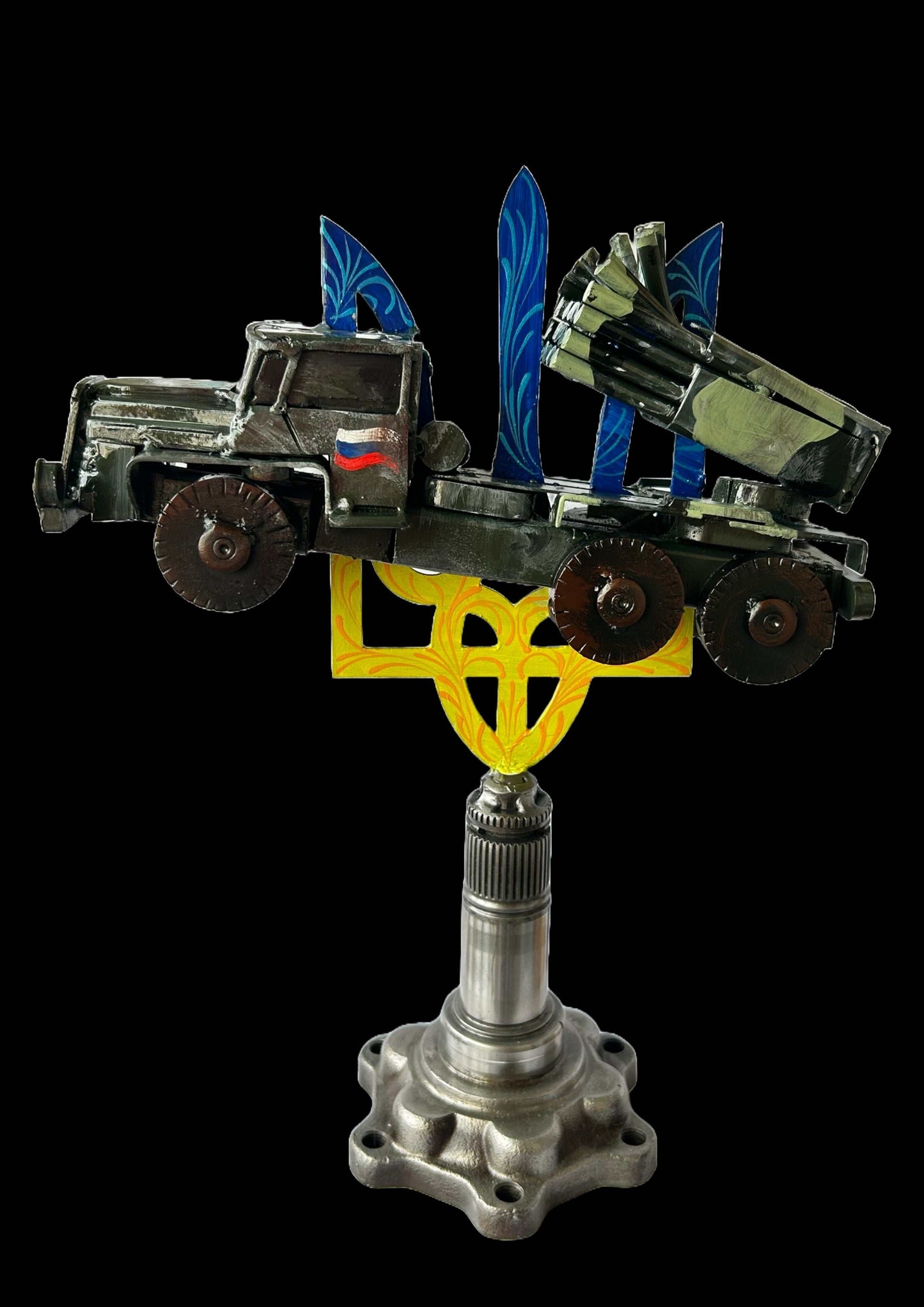 Destroyed Grad rocket impaled on 33cm Tryzub sculpture by Hisoshi Art Studio