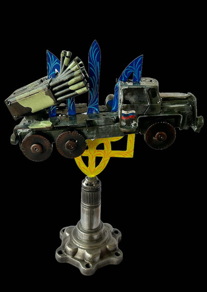 Destroyed Grad rocket impaled on 33cm Tryzub symbol sculpture