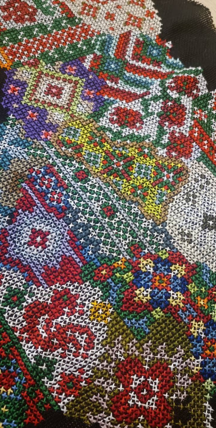 Hand-made embroidered map of Ukraine with traditional motifs to be signed by Within Temptation members