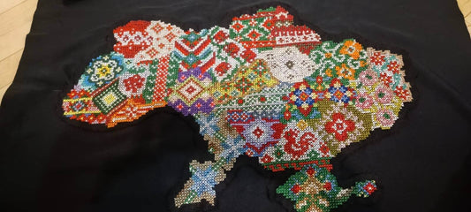 Hand-made embroidered map of Ukraine with traditional Ukrainian motifs, to be signed by Within Temptation band members