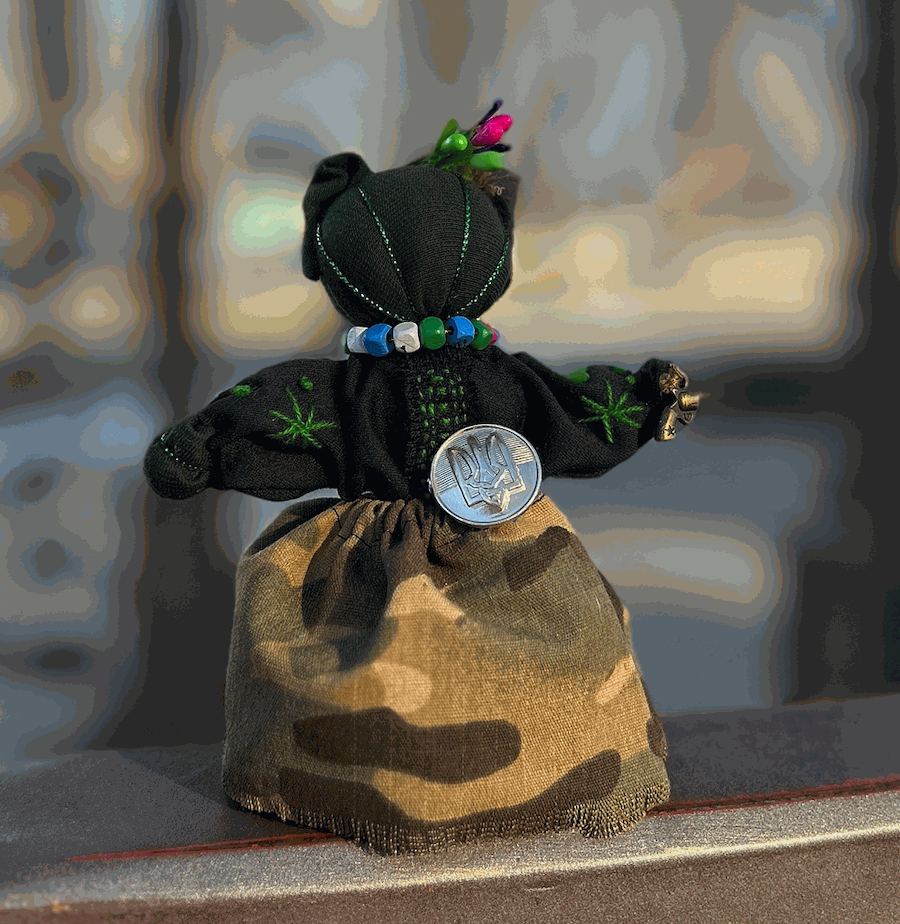 Handmade Ukrainian doll with traditional attire and embroidery