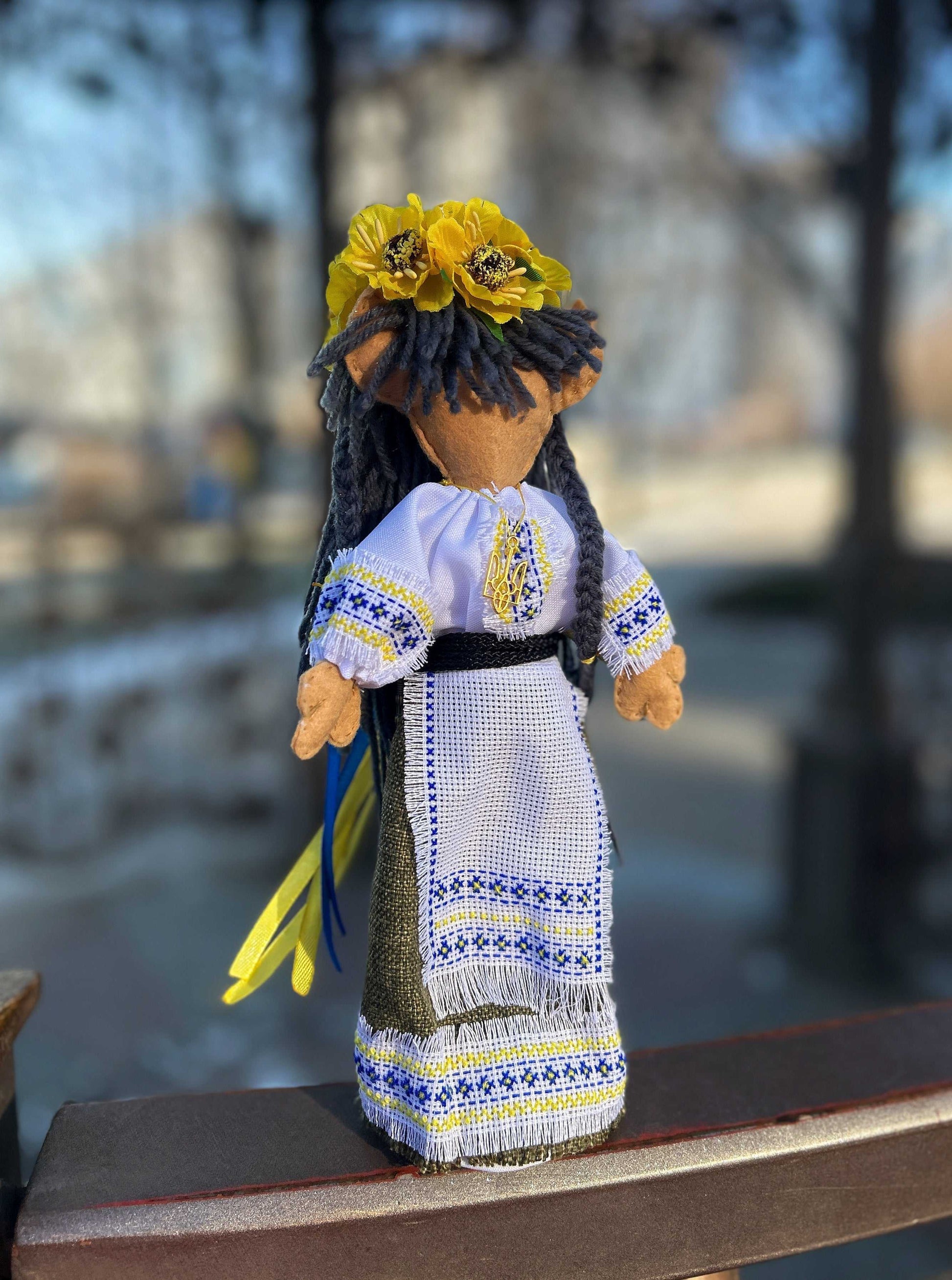 Handmade Ukrainian doll with traditional attire and embroidery