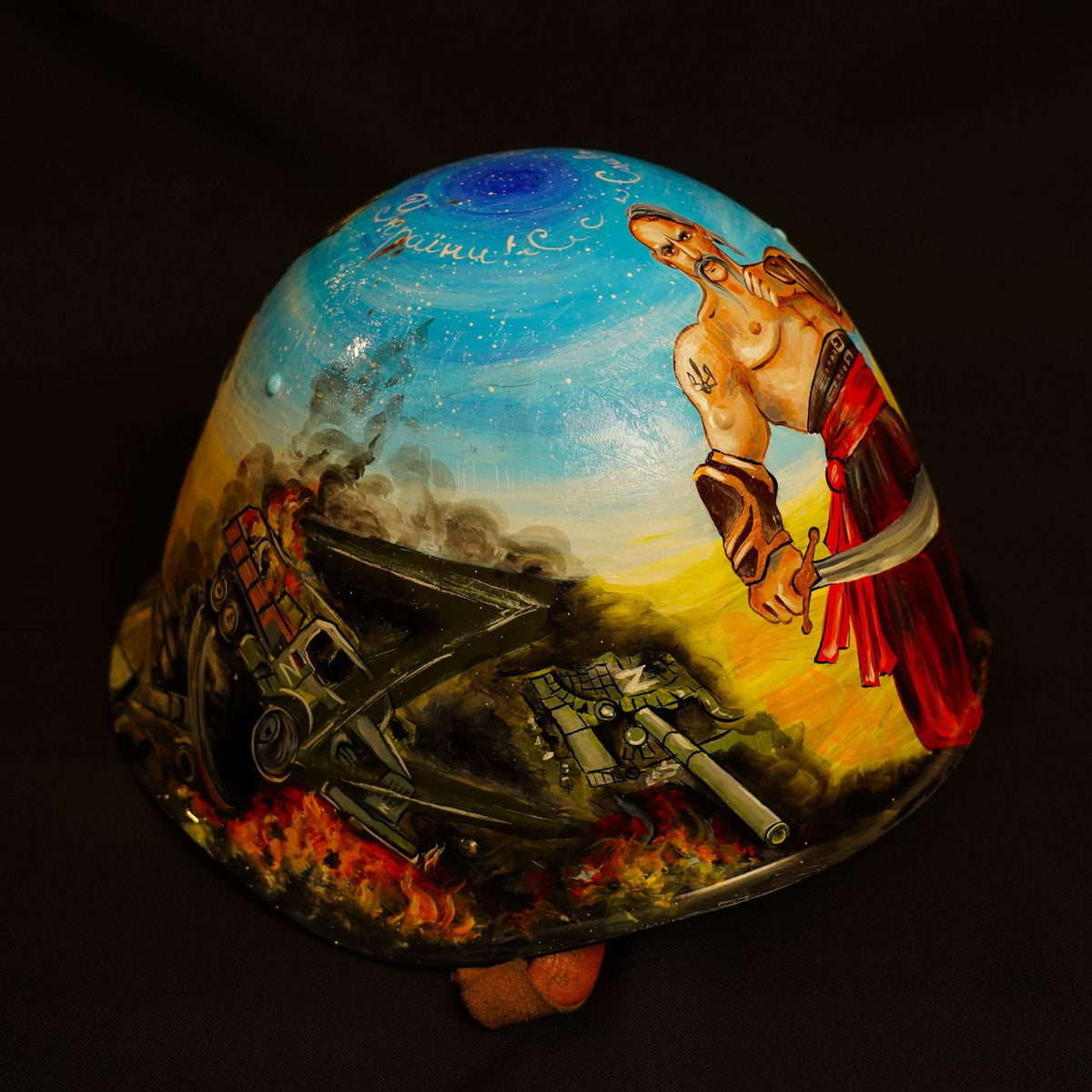 Enemy helmet transformed with Indomitable Cossack Spirit artwork featuring Ukrainian soldier and Cossack, carved "Z" marking