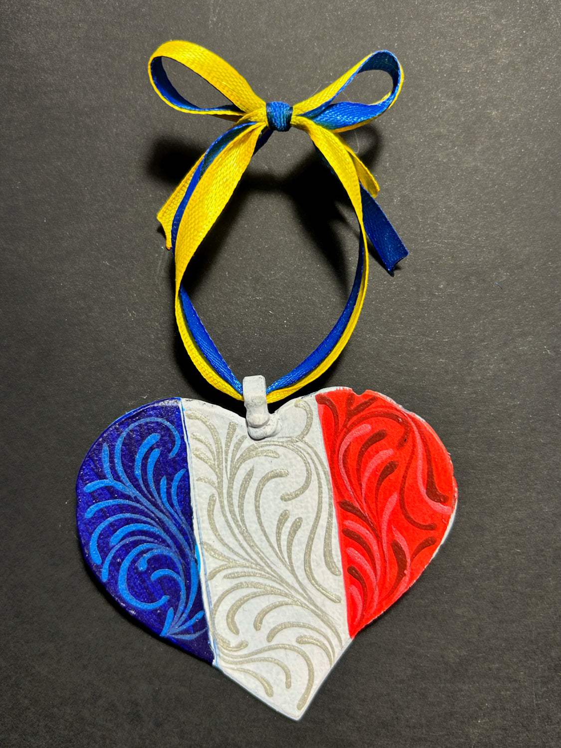 Iron Heart ornament painted with French and Ukrainian flags made from 122mm grad rocket steel