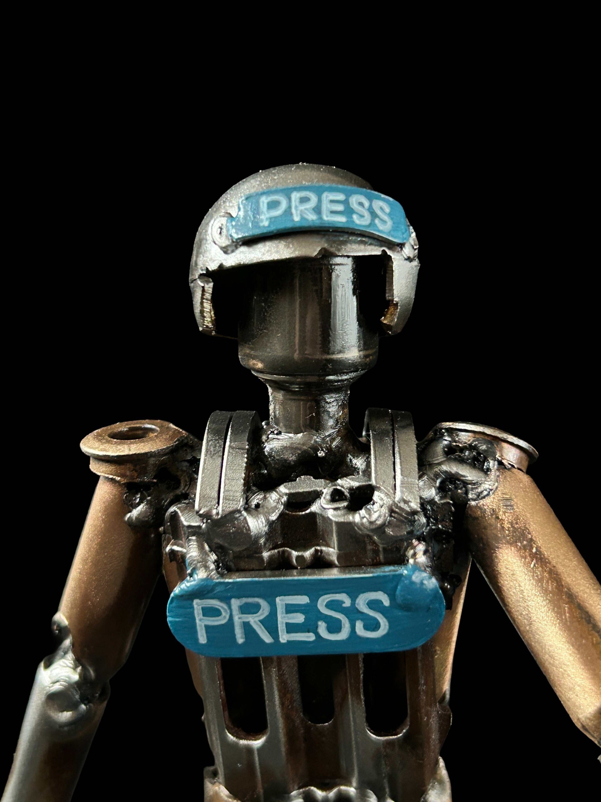 Sculpture of journalist created from small caliber shells by Lenny Pridatko and Hisoshi Art Studio