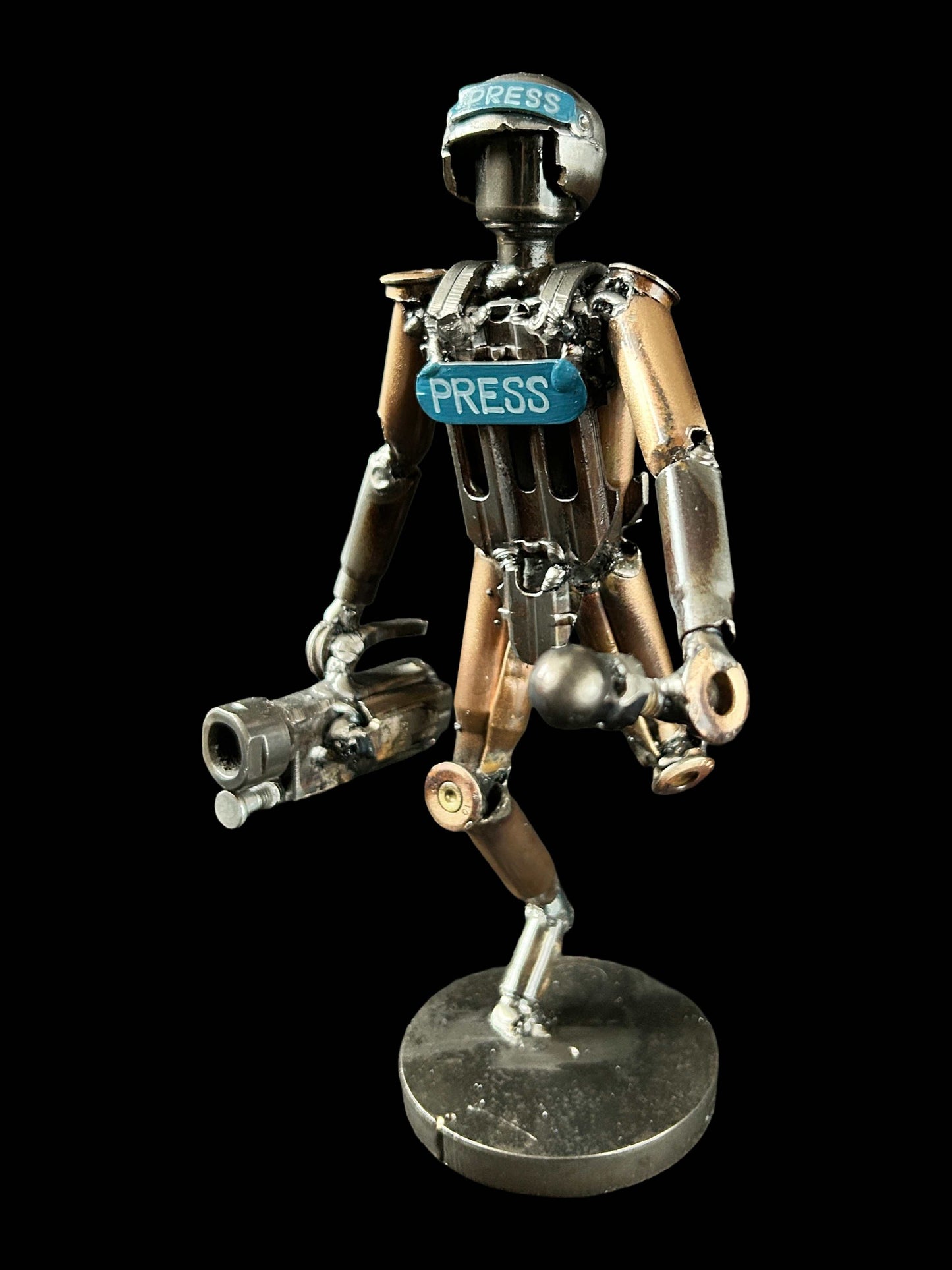 Sculpture of a journalist created from small caliber shells by Lenny Pridatko and Hisoshi Art Studio