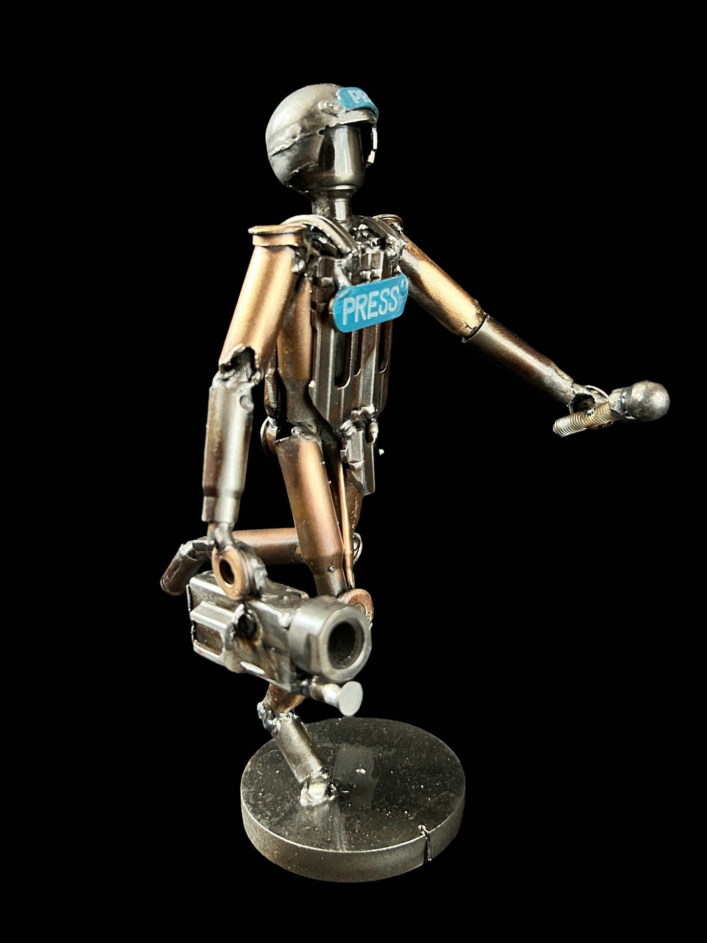 Sculpture of journalist created from small caliber shells by Lenny Pridatko, designed by Hisoshi Art Studio and painted by Anastasia Leonova