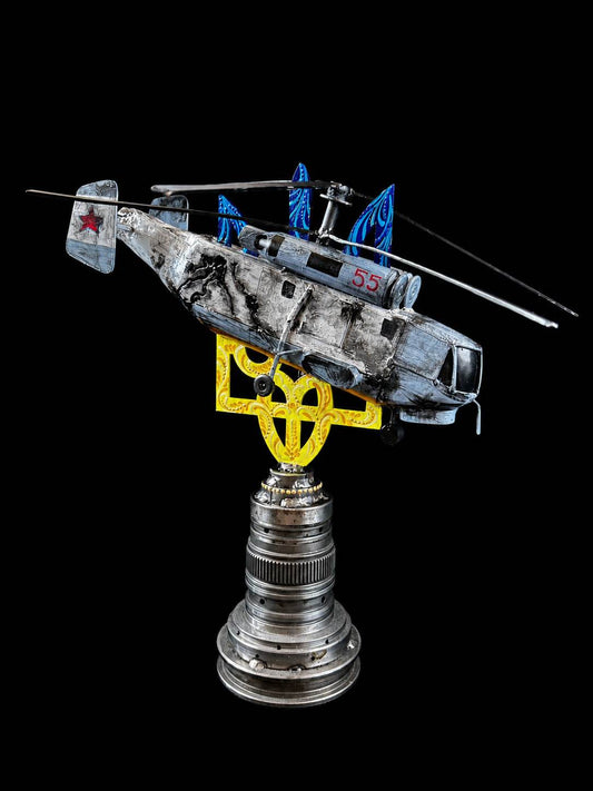 Destroyed KA-27 helicopter impaled on Tryzub sculpture by Hisoshi Art Studio