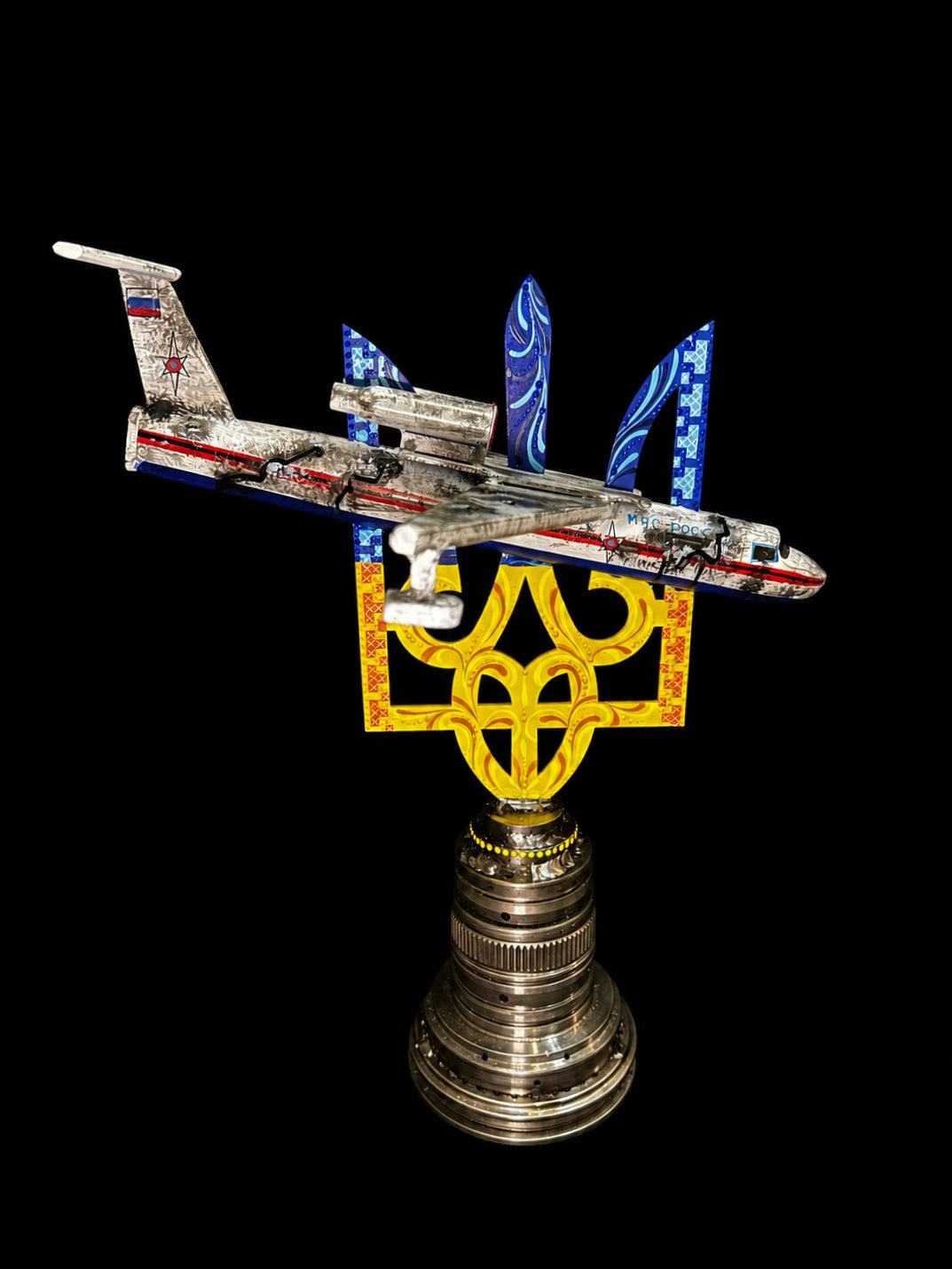 Beriev Be-200 impaled on Tryzub sculpture with KA-52 attack helicopter theme