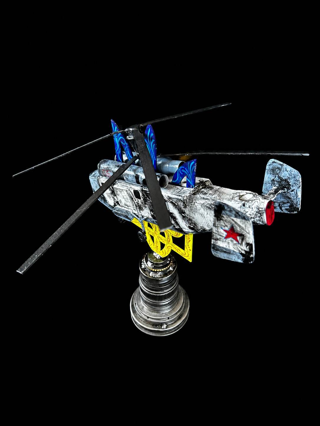 Destroyed KA-27 helicopter impaled on Tryzub sculpture by Hisoshi Art Studio