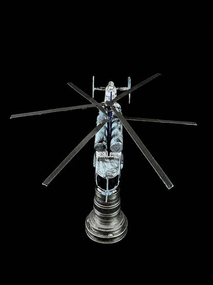 Destroyed KA-27 helicopter model impaled on Tryzub sculpture by Hisoshi Art Studio