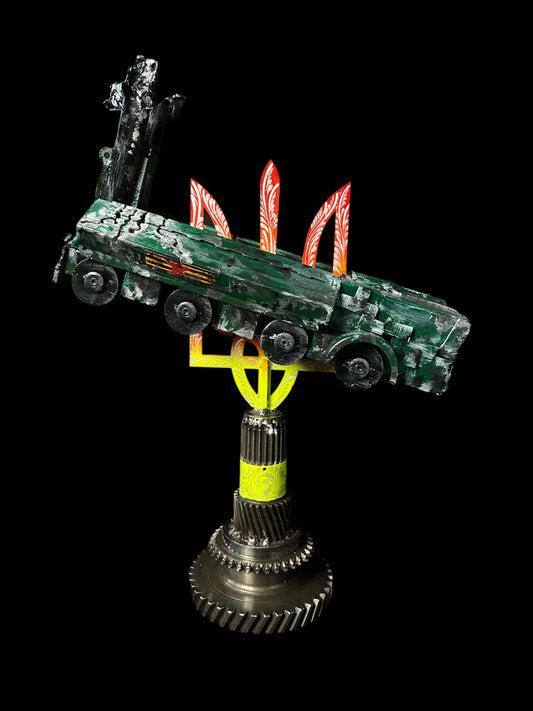 Destroyed K-300P Bastion-P model impaled on Tryzub sculpture with KA-52 attack helicopter theme