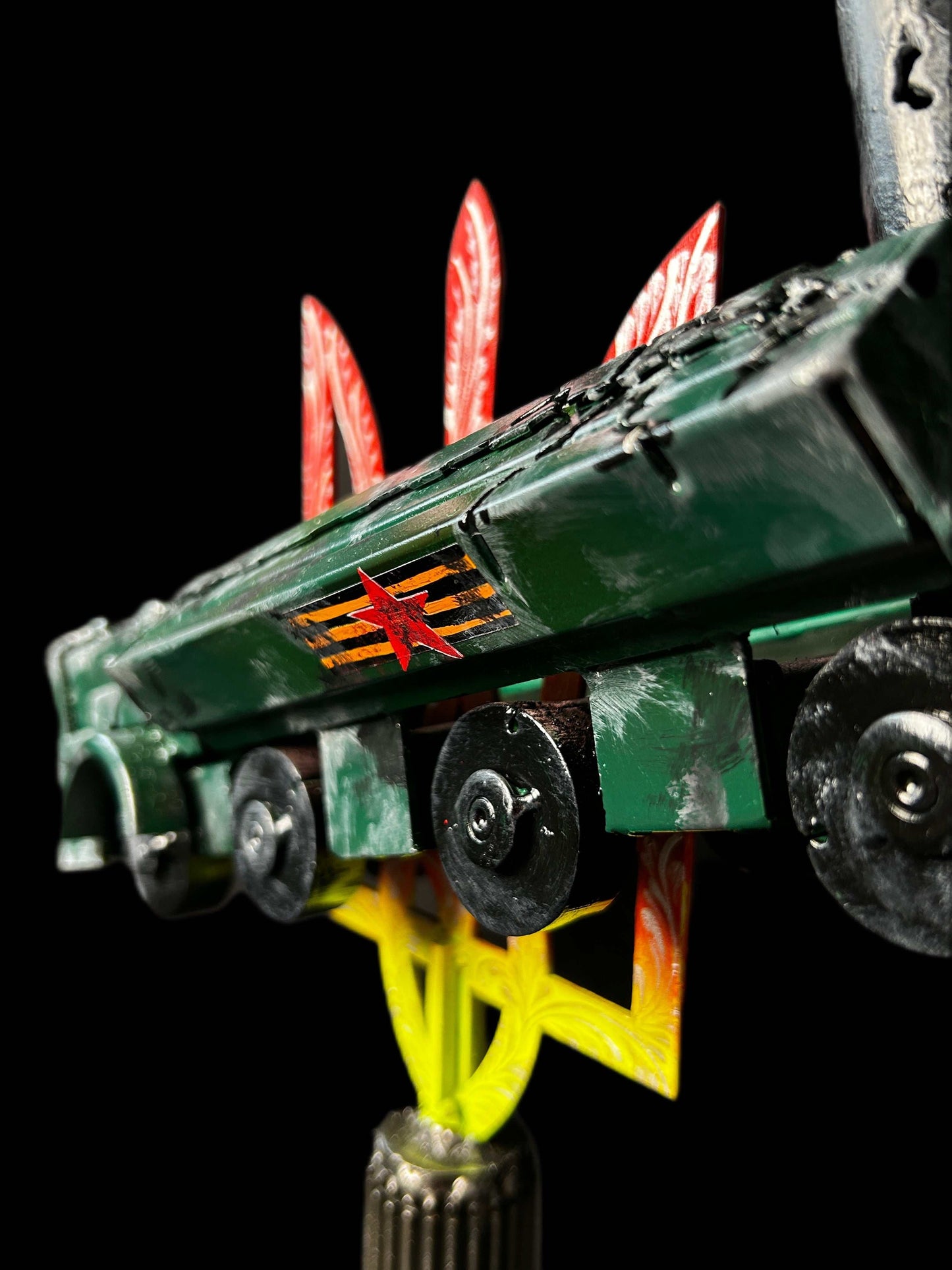 Destroyed K-300P Bastion-P on Tryzub sculpture with KA-52 attack helicopter theme