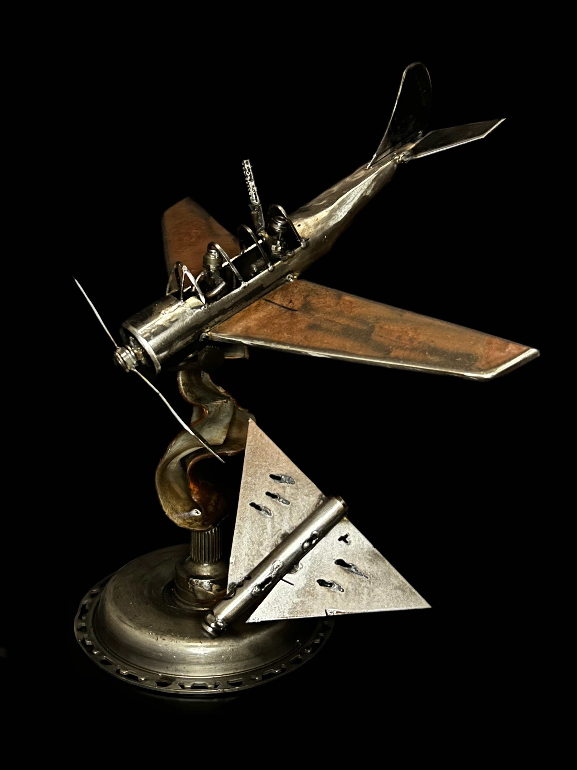 Yak-52 model shooting down Shahed drone artwork by Hisoshi Art Studio and Anastasia Leonova, 44x46x37cm