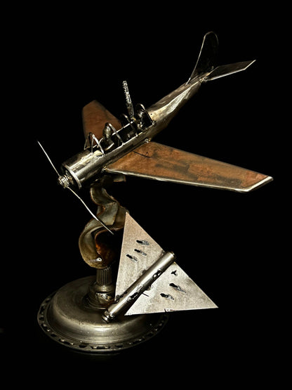 Yak-52 model shooting down Shahed drone artwork by Hisoshi Art Studio and Anastasia Leonova, 44x46x37cm