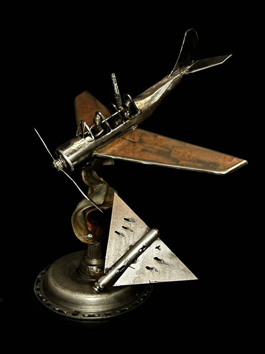 Yak-52 model shooting down Shahed drone artwork by Hisoshi Art Studio and Anastasia Leonova, 44x46x37cm