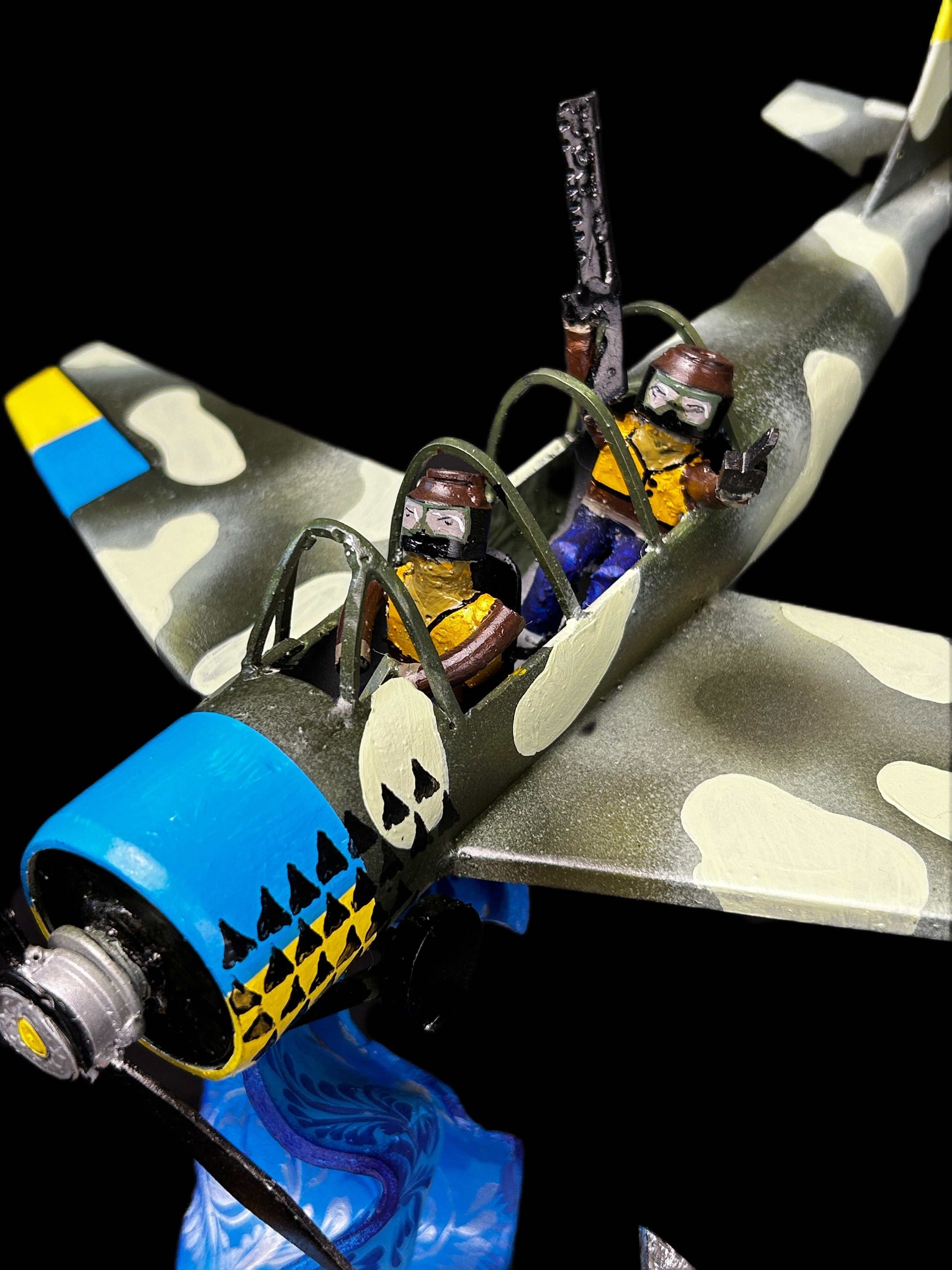 Yak-52 model shooting down Shahed drone artwork by Hisoshi Art Studio and Anastasia Leonova, 44x46x37cm