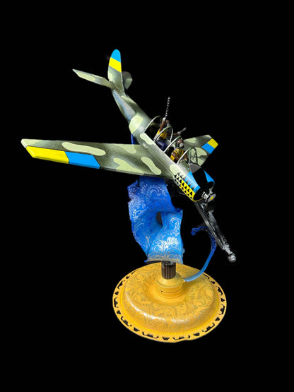 Yak-52 model shooting down Shahed drone artwork by Hisoshi Art Studio and Anastasia Leonova
