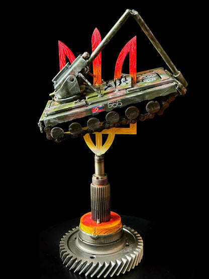 Koksan M1978 North Korean artillery gun impaled on Tryzub emblem artwork