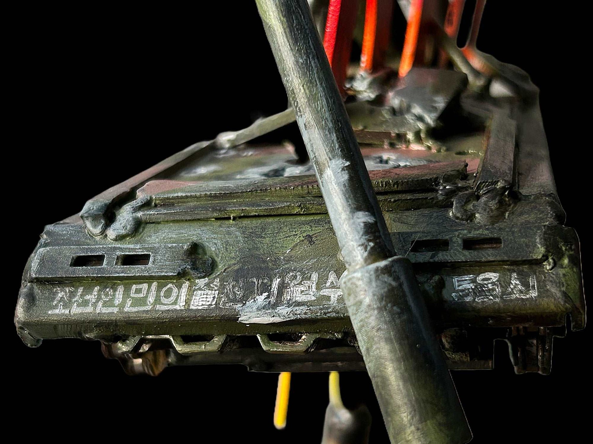 Koksan M1978 North Korean artillery gun impaled on Tryzub in artwork