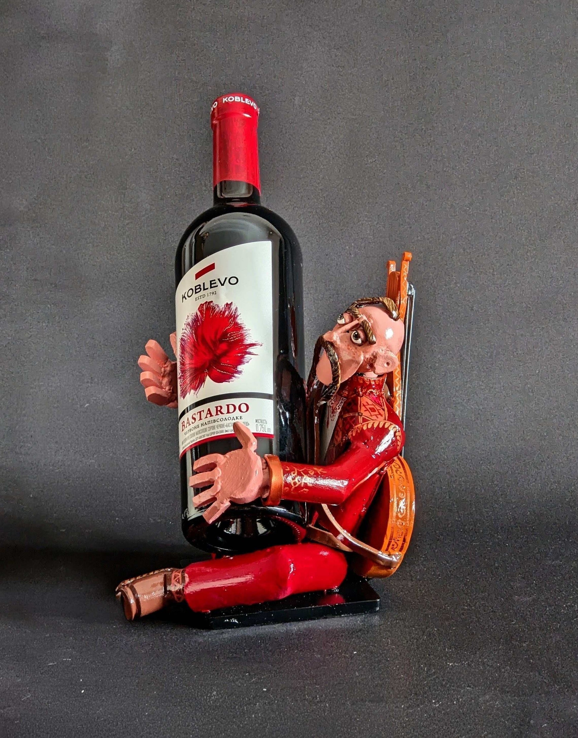Kozak Wine Holder handcrafted from frontline shells, designed by Hisoshi Art Studio and painted by Catherine Ruban