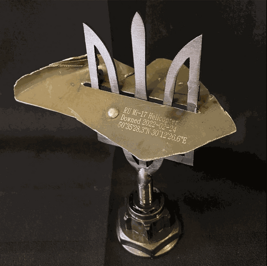Large Tryzub with engraved MI-17 helicopter piece from Antonov Airport, designed by Ukrainian artists