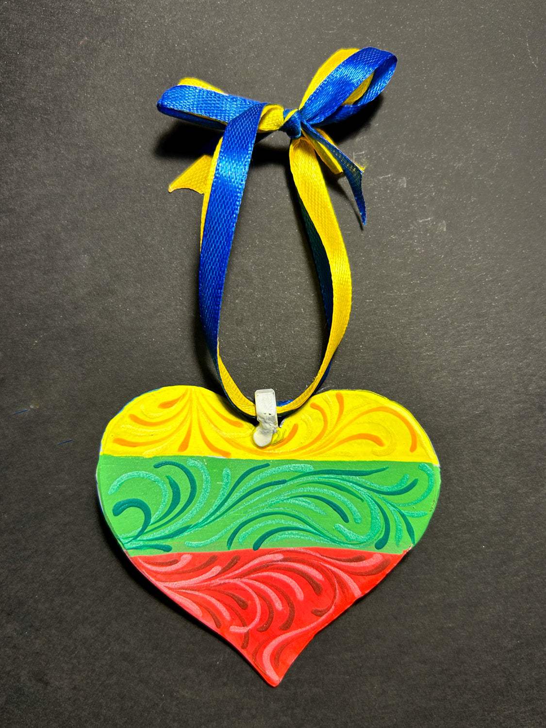 Iron Heart ornament painted with Lithuanian and Ukrainian flags made from 122mm grad rocket