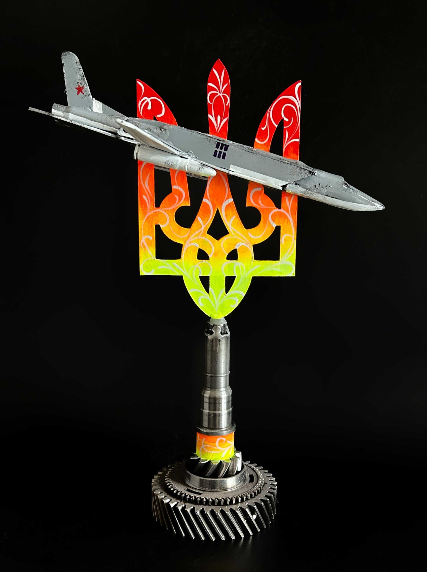 Occupant's downed TU22M3 aircraft impaled on 38cm Tryzub sculpture by Hisoshi Art Studio