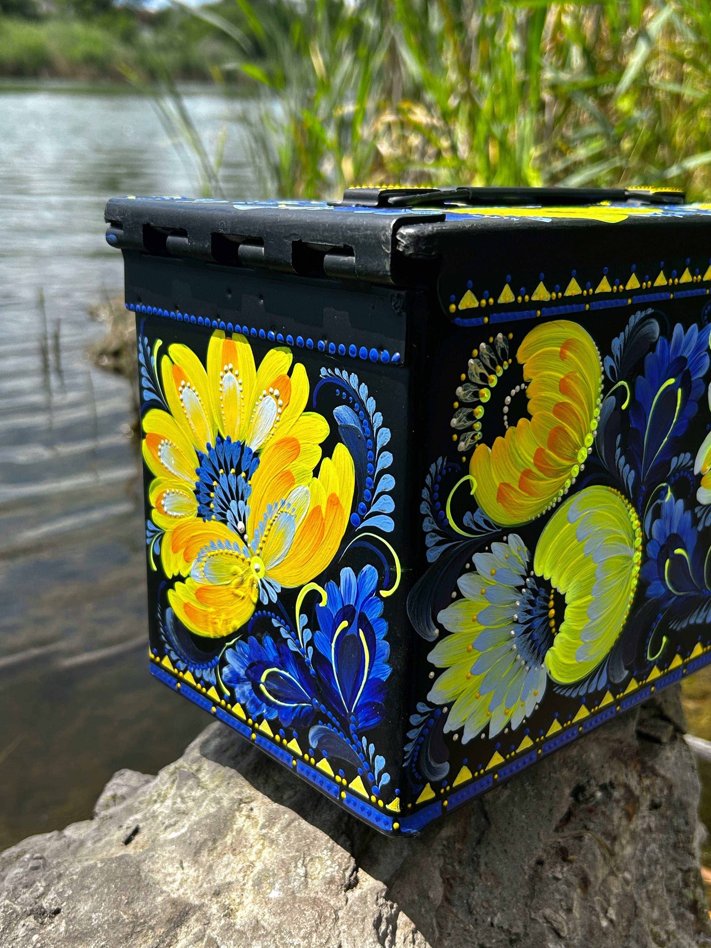 painted ammunition box with map of drones artwork