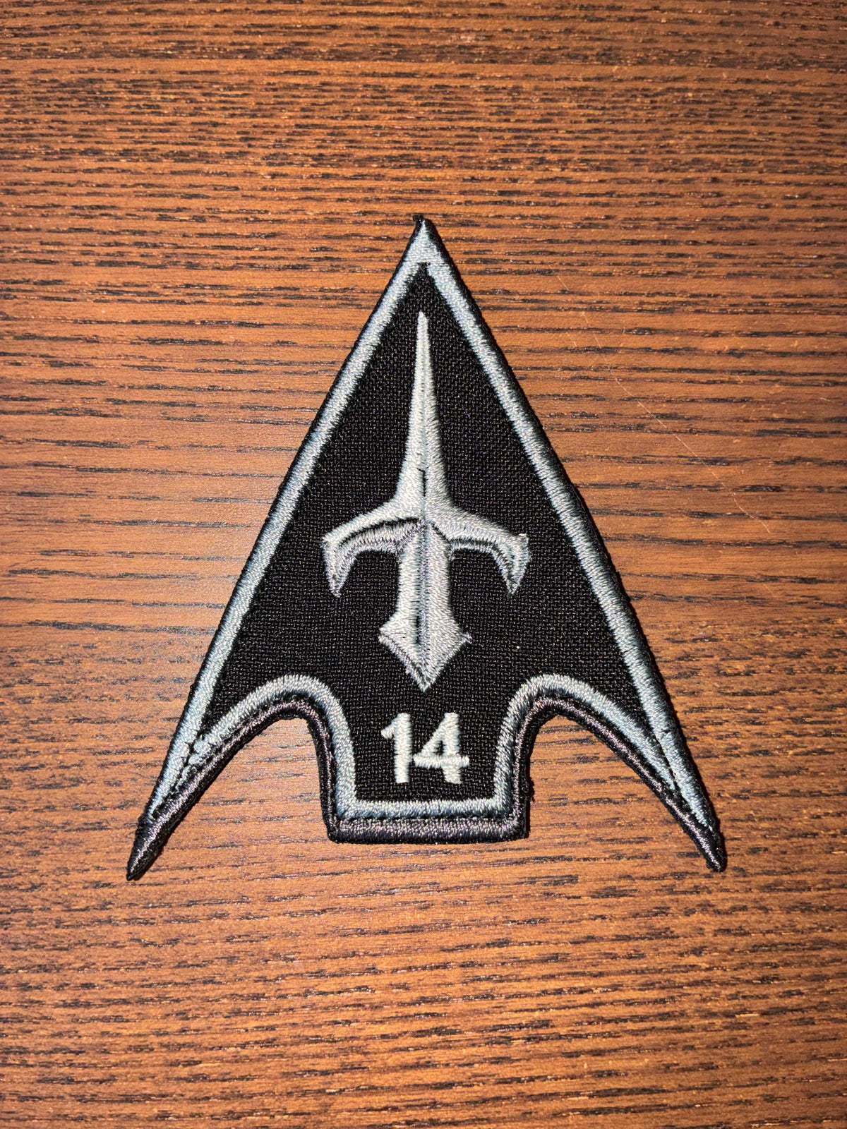 Patch - 1st Center of Unmanned Systems Forces, black embroidered arrowhead patch with white drone emblem and 14