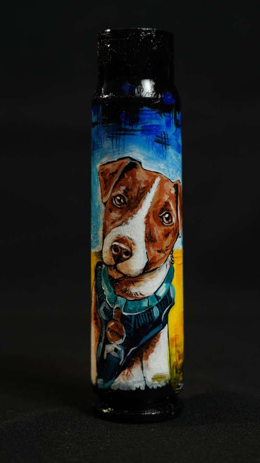 Patron the famous mine detecting dog drawn on a 30mm shell by Tanya Shacun
