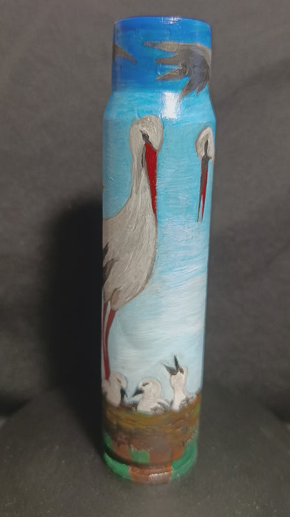 Storchfamilie auf 30mm Granate gemalt (#729). Gemalt von Julia Seminoh. (1100 JS).