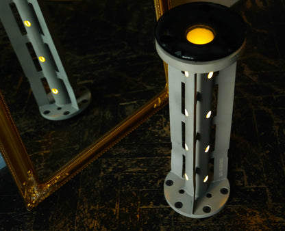 Rocket lamp made from 220 mm 9M27K1 cargo rocket symbolizing light overcoming darkness