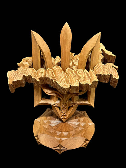Handmade wooden sculpture of Russia impaled on Tryzub by Vitalii Trokhymenko