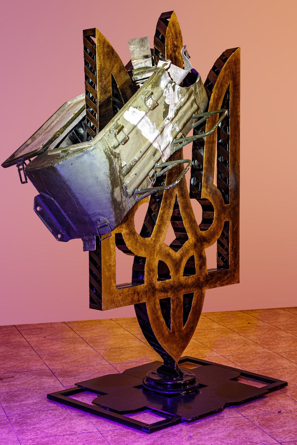 Large Tryzub sculpture impaled with destroyed Russian Kamaz truck part painted with "V"