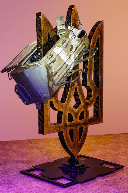 Large Tryzub sculpture impaled with destroyed Russian Kamaz truck part painted with "V"